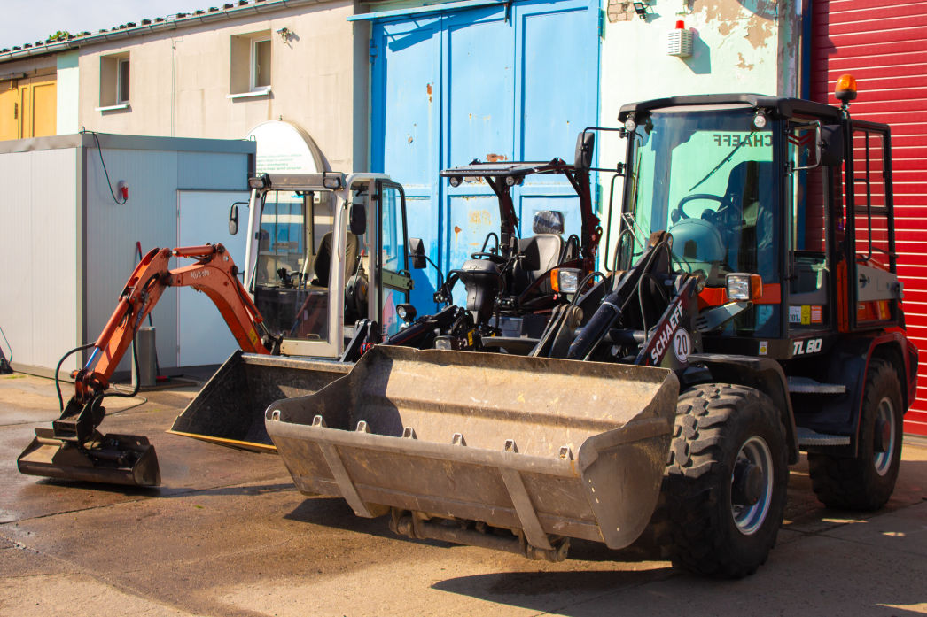 HMS Containerdienst Mini-Bagger und Radlader